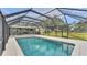 Refreshing screened pool in backyard oasis at 9585 Shreck Rd, Bartow, FL 33830