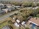 Aerial view showing house, pool, and RV at 1005 Shadow Run Dr, Lakeland, FL 33813