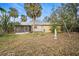 Fenced backyard with a statue and playset at 1005 Shadow Run Dr, Lakeland, FL 33813