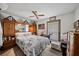 Bedroom with built-in wooden cabinets and a queen-size bed at 1005 Shadow Run Dr, Lakeland, FL 33813