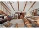 Living room with high ceilings, exposed beams, and a lofted area at 1005 Shadow Run Dr, Lakeland, FL 33813