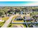 Aerial view of a neighborhood featuring various houses at 1012 Robin Ln, Winter Haven, FL 33884