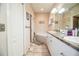 Spacious bathroom with double sinks, a large garden tub, and a separate shower at 1012 Robin Ln, Winter Haven, FL 33884