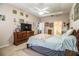 Spacious bedroom with a large dresser and en-suite bathroom at 1012 Robin Ln, Winter Haven, FL 33884