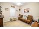 Bedroom with futon, window, and closet at 1012 Robin Ln, Winter Haven, FL 33884