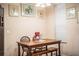 Charming dining area with wooden table and bench seating at 1012 Robin Ln, Winter Haven, FL 33884