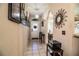 Inviting entryway with tile flooring, neutral walls, and elegant light fixture at 1012 Robin Ln, Winter Haven, FL 33884