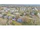 An aerial view showcasing a charming blue house in a residential area at 1033 Fleming Ave, Lakeland, FL 33815