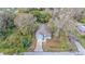 Aerial view of a light blue house with a driveway and yard at 1033 Fleming Ave, Lakeland, FL 33815