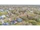 Aerial view showing a light blue house and surrounding neighborhood at 1033 Fleming Ave, Lakeland, FL 33815