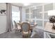 Home office with wood desk, chairs, and decorative wall paneling at 1040 Aruba Ave, Mulberry, FL 33860