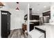 Elegant kitchen entrance featuring dark wood cabinets and modern appliances at 1495 Davis Ave, Bartow, FL 33830