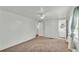 Bright bedroom with carpet flooring and access to bathroom at 1610 Reynolds Rd # 236, Lakeland, FL 33801