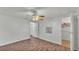 Spacious bedroom with wood-look flooring and closet at 1610 Reynolds Rd # 236, Lakeland, FL 33801