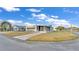 Mobile home on corner lot with mature trees nearby at 1610 Reynolds Rd # 236, Lakeland, FL 33801