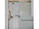 Clean shower with glass door and grab bars at 1610 Reynolds Rd # 236, Lakeland, FL 33801