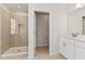 Spa-like bathroom with a large shower and double vanity at 171 Golden Noble St, Kissimmee, FL 34747