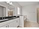 Modern bathroom with double vanity and soaking tub at 171 Golden Noble St, Kissimmee, FL 34747