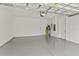 Spacious garage with epoxy floor and ample storage at 171 Golden Noble St, Kissimmee, FL 34747