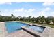 Relaxing pool and spa with spacious patio at 171 Golden Noble St, Kissimmee, FL 34747