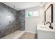 Modern bathroom featuring a large, tiled shower with rainfall shower head at 20 N Lake Idylwild Dr, Winter Haven, FL 33881