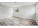 Bedroom featuring luxury vinyl plank flooring, recessed lighting, and a large closet at 20 N Lake Idylwild Dr, Winter Haven, FL 33881