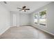 Clean bedroom featuring tile floors, closet and windows allowing natural light at 20 N Lake Idylwild Dr, Winter Haven, FL 33881