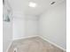 Walk in closet with tiled floors and shelving at 20 N Lake Idylwild Dr, Winter Haven, FL 33881