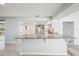 Kitchen island with granite countertop and a view to the rest of the house at 20 N Lake Idylwild Dr, Winter Haven, FL 33881