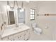 Bathroom with updated vanity and walk-in shower at 2004 Varner Cir, Winter Haven, FL 33884