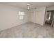 Bedroom with carpet flooring and a window with shutters at 2004 Varner Cir, Winter Haven, FL 33884