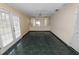 Dining room with built-in cabinetry and green tile flooring at 2004 Varner Cir, Winter Haven, FL 33884