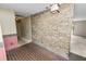 Brick floor entryway with double doors and view to living room at 2004 Varner Cir, Winter Haven, FL 33884