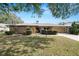 House exterior featuring stone accents and landscaping at 2004 Varner Cir, Winter Haven, FL 33884