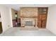 Brick fireplace as a focal point in the living room at 2004 Varner Cir, Winter Haven, FL 33884