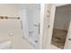 Walk-in shower with built-in seat and grab bars at 2004 Varner Cir, Winter Haven, FL 33884