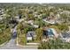 Aerial view showing house, pool, and neighborhood at 2016 Seminole Trl, Lakeland, FL 33803