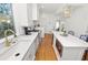 Bright white kitchen with marble countertops and gold accents at 2016 Seminole Trl, Lakeland, FL 33803