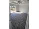 Spacious bedroom with sliding glass door to backyard at 2021 Alderman Rd, Auburndale, FL 33823