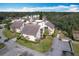 Aerial view of a community of condo buildings with lush landscaping at 2025 Sylvester Rd # N304, Lakeland, FL 33803