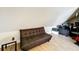 An attic room features a futon couch at 2025 Sylvester Rd # N304, Lakeland, FL 33803