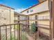 Courtyard view of condo building with landscaping and walkways at 2025 Sylvester Rd # N304, Lakeland, FL 33803