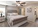 Spacious primary bedroom with plush carpet and large bed at 2210 Oldham Ct, Haines City, FL 33844