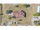 Aerial view of a house with brown roof and large yard at 2455 Gerber Dairy Rd, Winter Haven, FL 33880