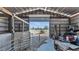 View through barn with open door to pasture at 2455 Gerber Dairy Rd, Winter Haven, FL 33880