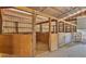 Interior view of barn with multiple horse stalls at 2455 Gerber Dairy Rd, Winter Haven, FL 33880