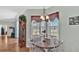 Bright breakfast nook featuring a bay window and farmhouse decor at 2455 Gerber Dairy Rd, Winter Haven, FL 33880