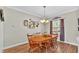 Formal dining room with a wood table and six chairs at 2455 Gerber Dairy Rd, Winter Haven, FL 33880