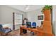 Bright home office features built-in wooden desk and cabinets at 2455 Gerber Dairy Rd, Winter Haven, FL 33880