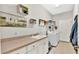 Laundry room with washer, dryer, and utility sink at 2455 Gerber Dairy Rd, Winter Haven, FL 33880